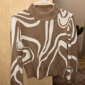 Tan/ beige thick sweater. Size small, it’s only been worn a handful of times.